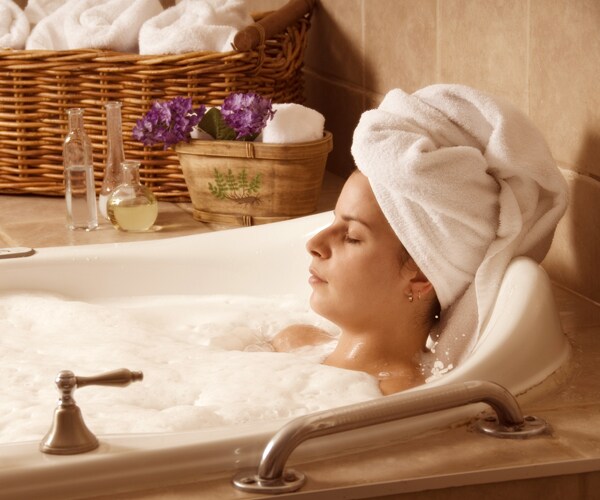 a woman taking a bath