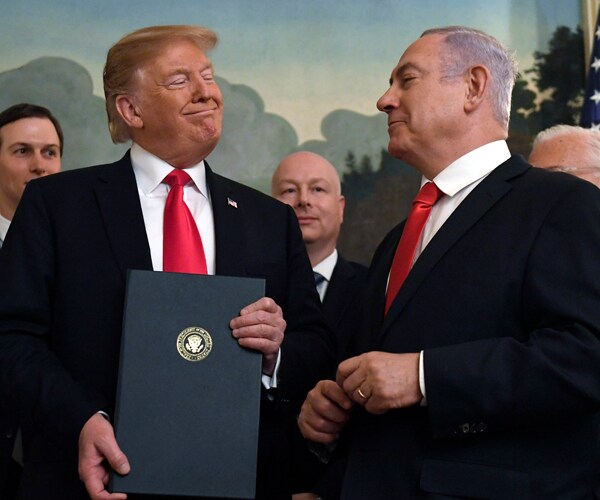 President Donald Trump smiles at Israeli Prime Minister Benjamin Netanyahu