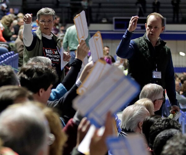 Participants at an Iowa caucuses site on Feb. 3