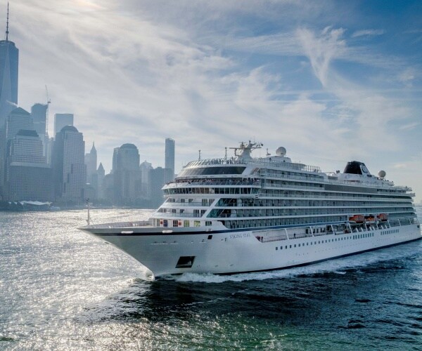 the viking star cruise ship sails past downtown new york city.