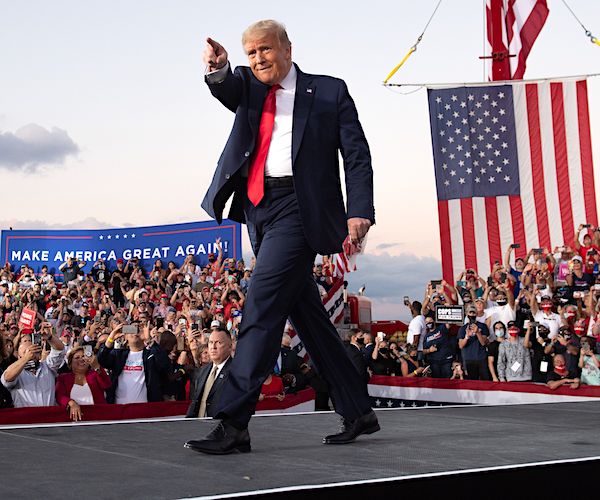 president donald trump takes the stage in his return to campaign rallies after his bout with covid-19