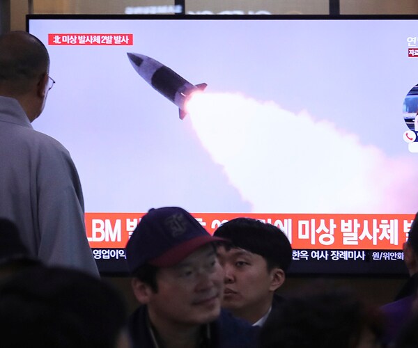 A North Korean missile launch, date unspecified, is shown on South Korean television