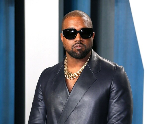 kanye west walks red carpet