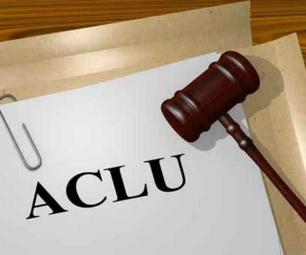 aclu is shown on a file folder next to a gavel