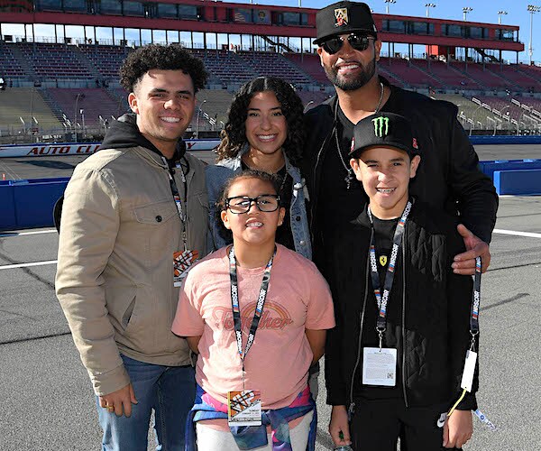 Albert Pujols poses with his children A.J. Pujols, Ester Pujols, Lexie Naranjo, and Ezra Pujols this february
