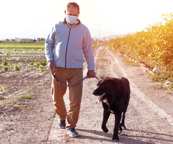 a man walking his dog