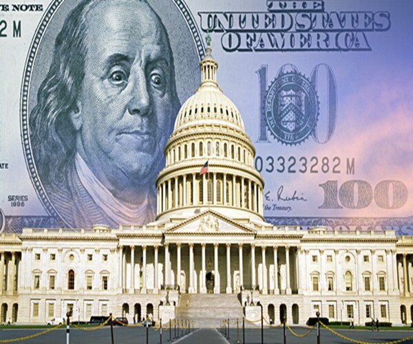 digital composite: u.s. capitol with one hundred dollar bill 


