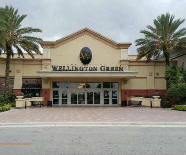 one of the entrances to the mall at wellington is shown in wellington, florida