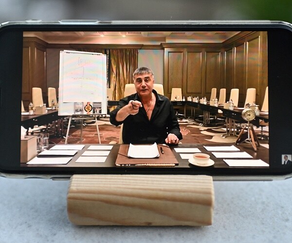 video of sedat peker shown on mobile phone