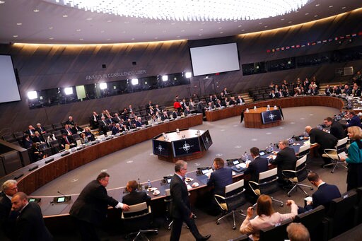 The Latest: US to Suspend Arms Pact over Russia's 'cheating'