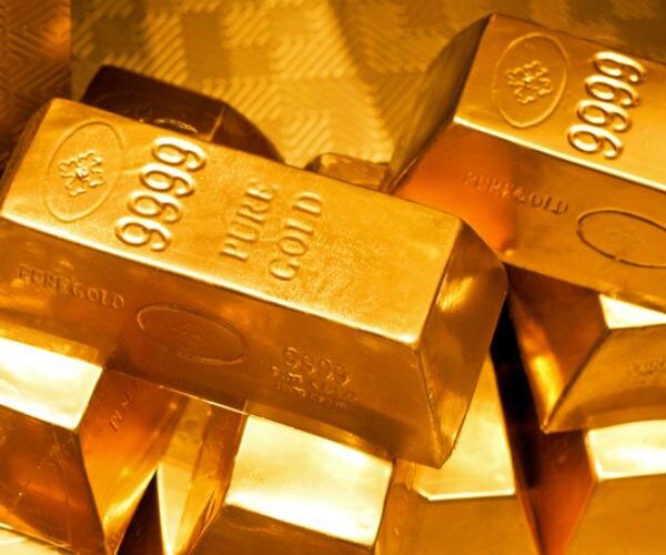 Gold Rises More Than 1 Percent After Fed Hikes Rates