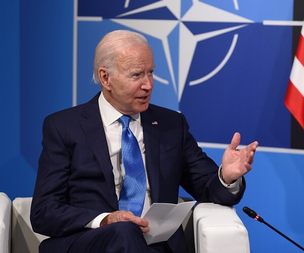 joe biden gestures while speaking