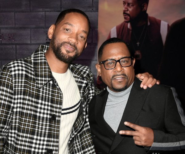 will smith, left, and martin lawrence attend a premiere