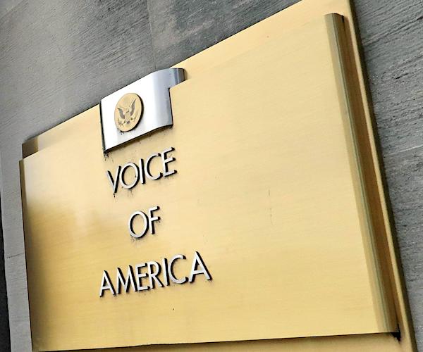 the voice of america sign on its building in washington, d.c.