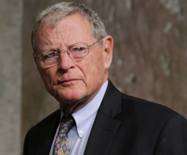 oklahoma republican senator jim inhofe looks to his left in the capitol hill rotunda
