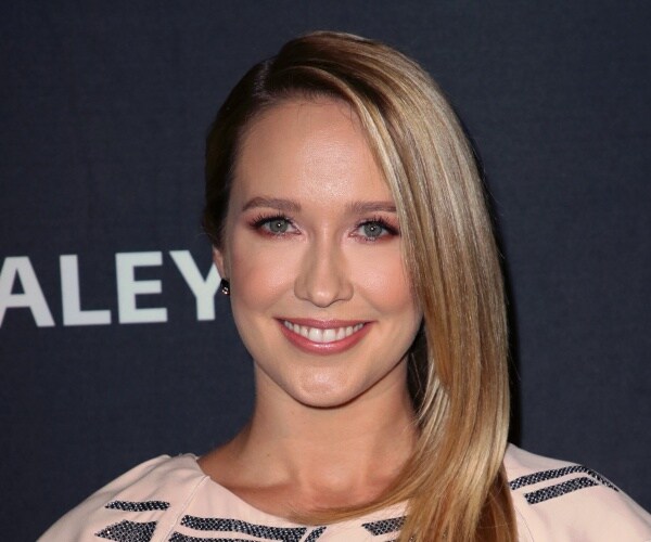 anna camp in a light pink dress