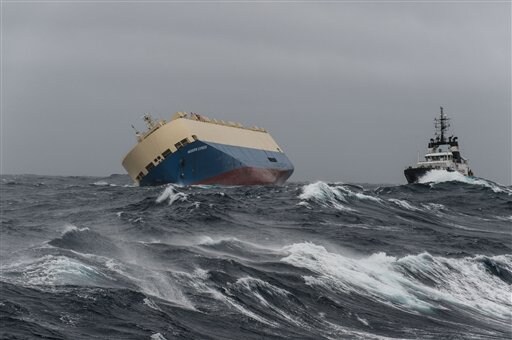 Rescuers tow Capsized Cargo Ship before it Hits French Coast