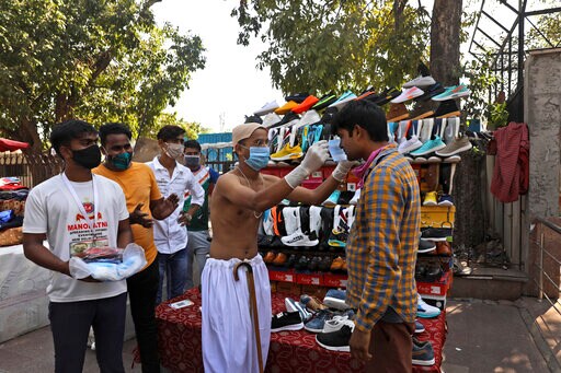 India's COVID-19 Fatalities Top 100,000, behind US, Brazil