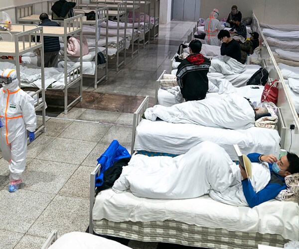 patients in a temporary hospital constructed in wuhan, china