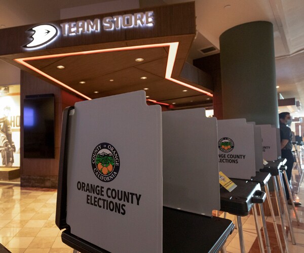 voting booths are lined up in a mall