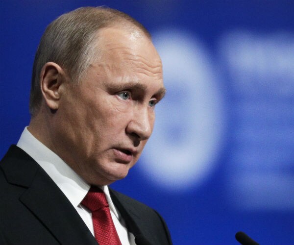 Russian President Vladimir Putin making a speech.