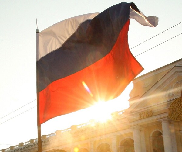 russian flag blows in wind