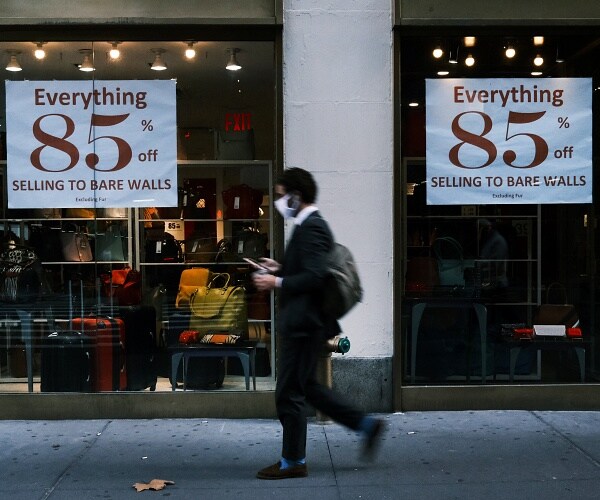 sale signs in business window