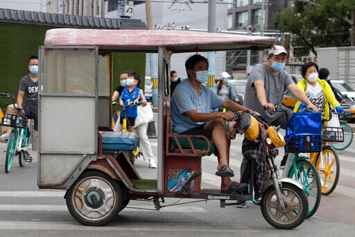 Asia Today: Beijing's Daily Cases Drop but Seoul's Increase