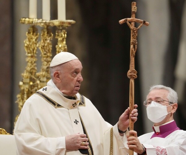 Pope Francis holds the pastoral staff