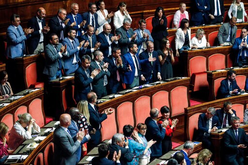 Spanish Aid Boat with 147 Migrants Anchored off Italian Isle