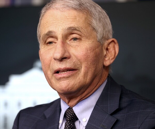 anthony fauci speaks in press briefing room