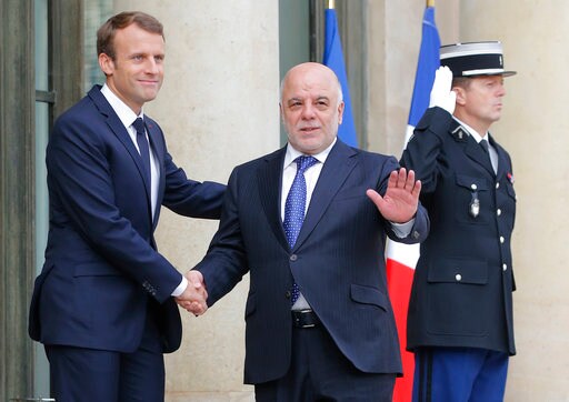 The Latest: Iraqi PM Says Forces Have Retain Hawija