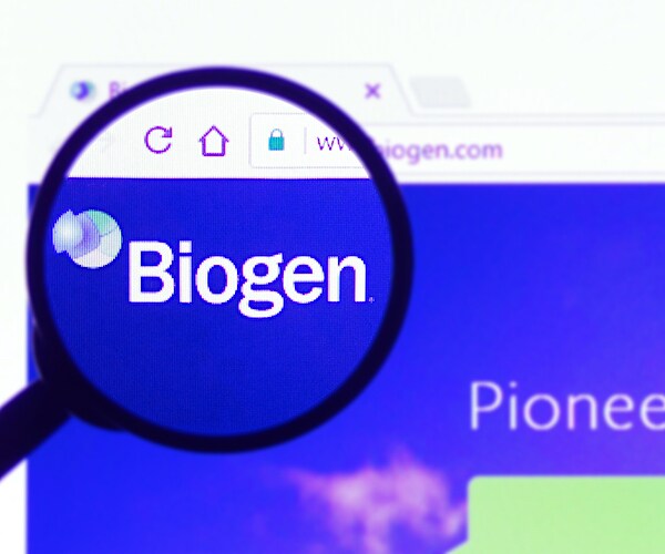 a biogen website page is highlighted through a magnifying glass