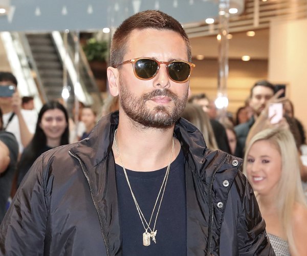 fans greet scott disick