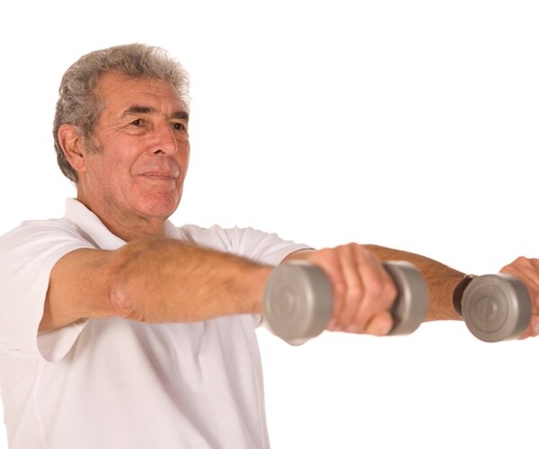 a older man lifts weights
