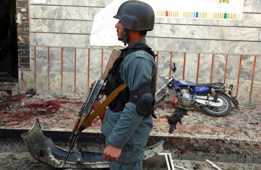 Afghan Officials: Taliban Attacks Kill 14 Troops, Policemen