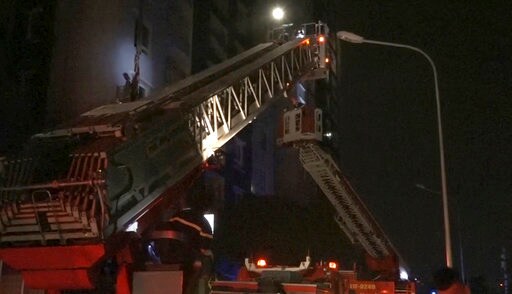 The Latest: More than 1,100 Escape Vietnam Fire