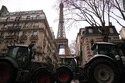 Farmers Drive Tractors through Paris and Block Highways in Greece to Protest Free Trade Deal
