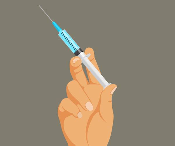 illustration of a hand holding a syringe