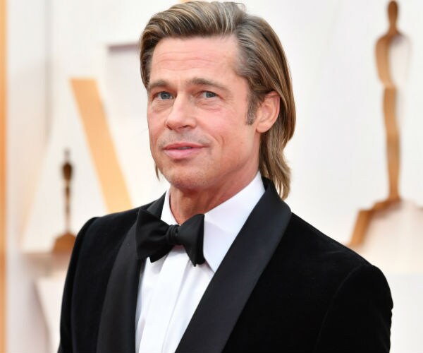brad pitt is shown in a tuxedo