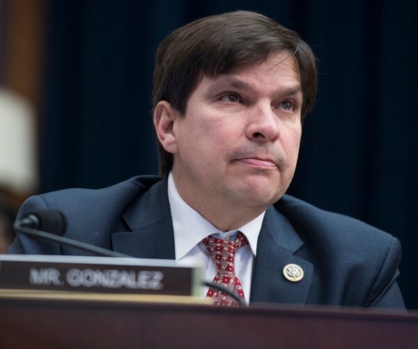 rep. vicente gonzalez listens at the bench in a committee hearing