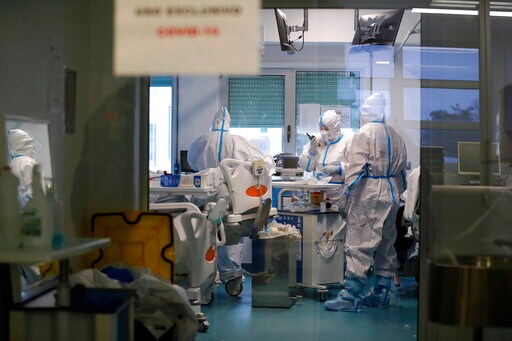 Portugal Scrambles for Virus Beds; Health System Threatened