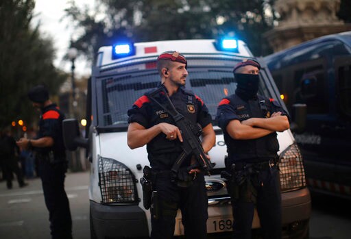 The Latest: Catalans Divided as Announcement Approaches