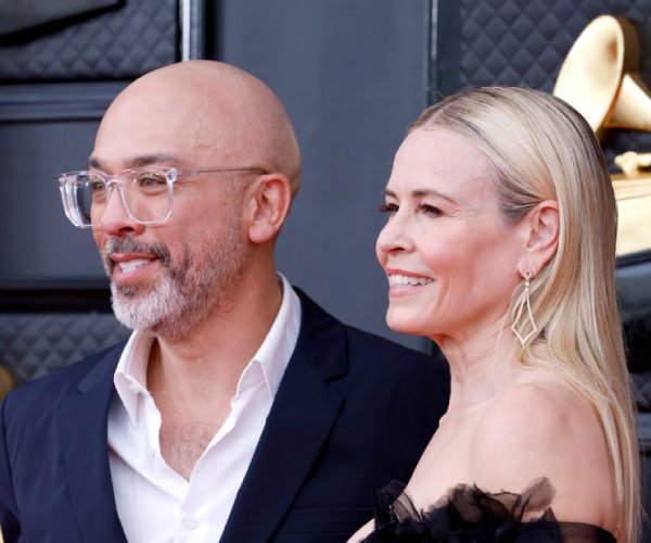 jo koy, left, and chelsea handler arrive at an event