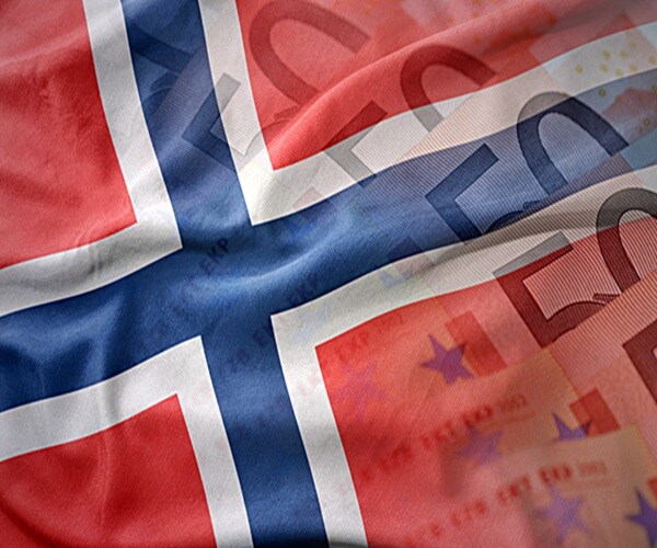 colorful waving national flag of norway on a euro money banknotes background. finance concept 