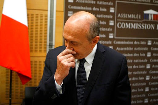 French Minister Defends Himself over Violence of Macron Aide