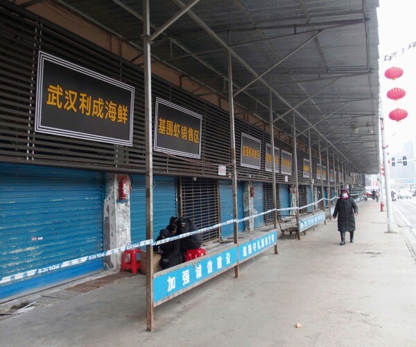 Virus Deaths Rise to 132 in China as Foreigners Leave