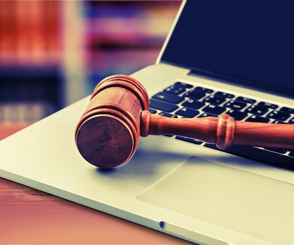 Sheriff's Deputy's Ex-Wife Arrested Over Facebook Post, She Sues