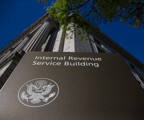 looking up at the sign of the IRS in washington d.c.
