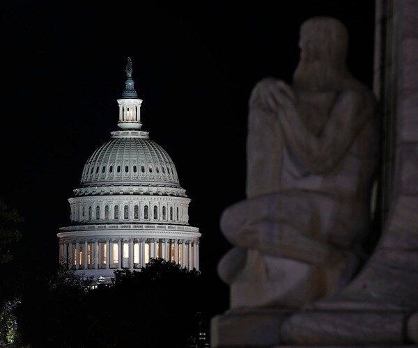 floodlights illuminate the capitol dome